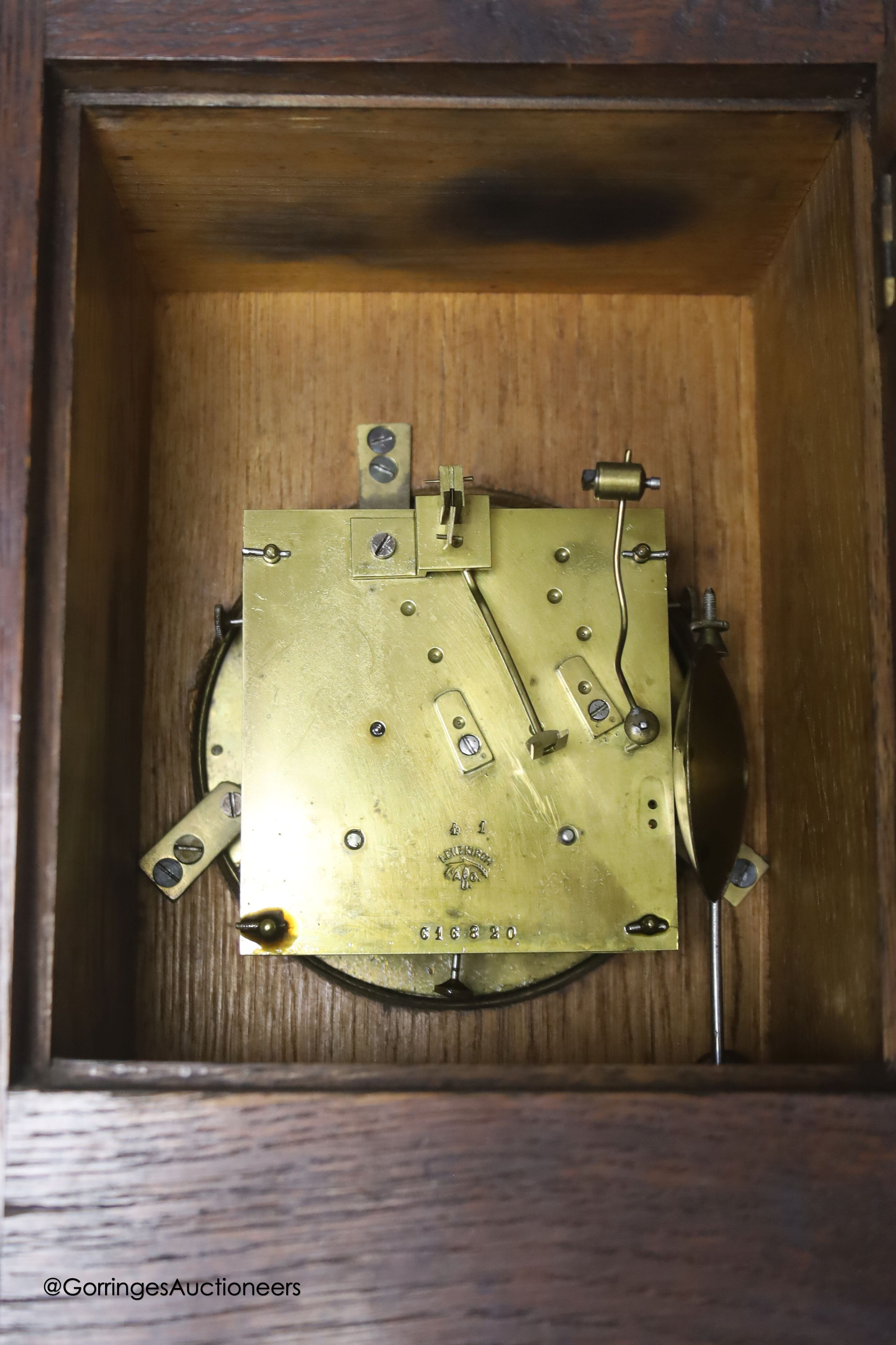 A late 19th century oak mantel clock, retailed by Crambrook of Southampton height 33cm